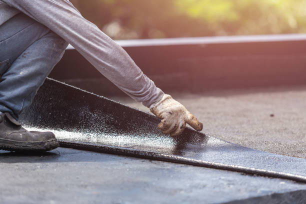 Professional Waterproofing technician working in Hartselle, AL